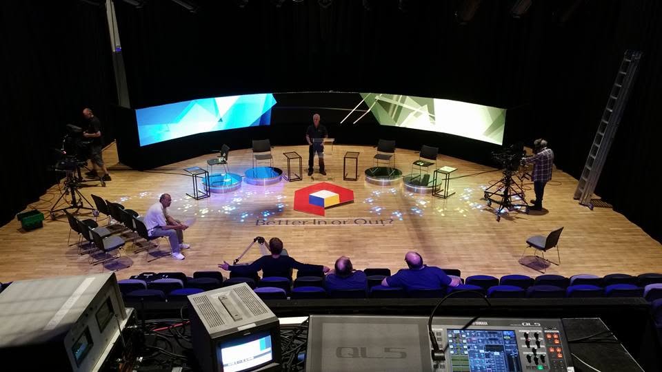 View from a university theatre control position during a live production